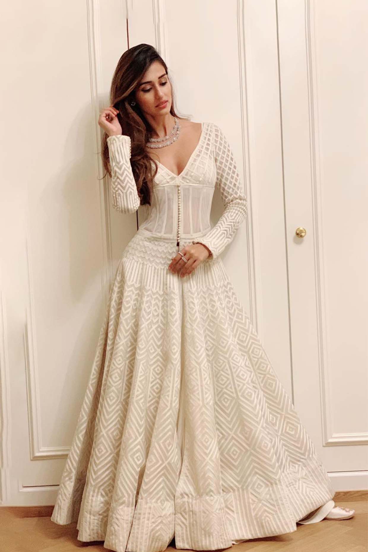 WOMEN'S BLACK JACKET, LEHENGA AND PEPLUM