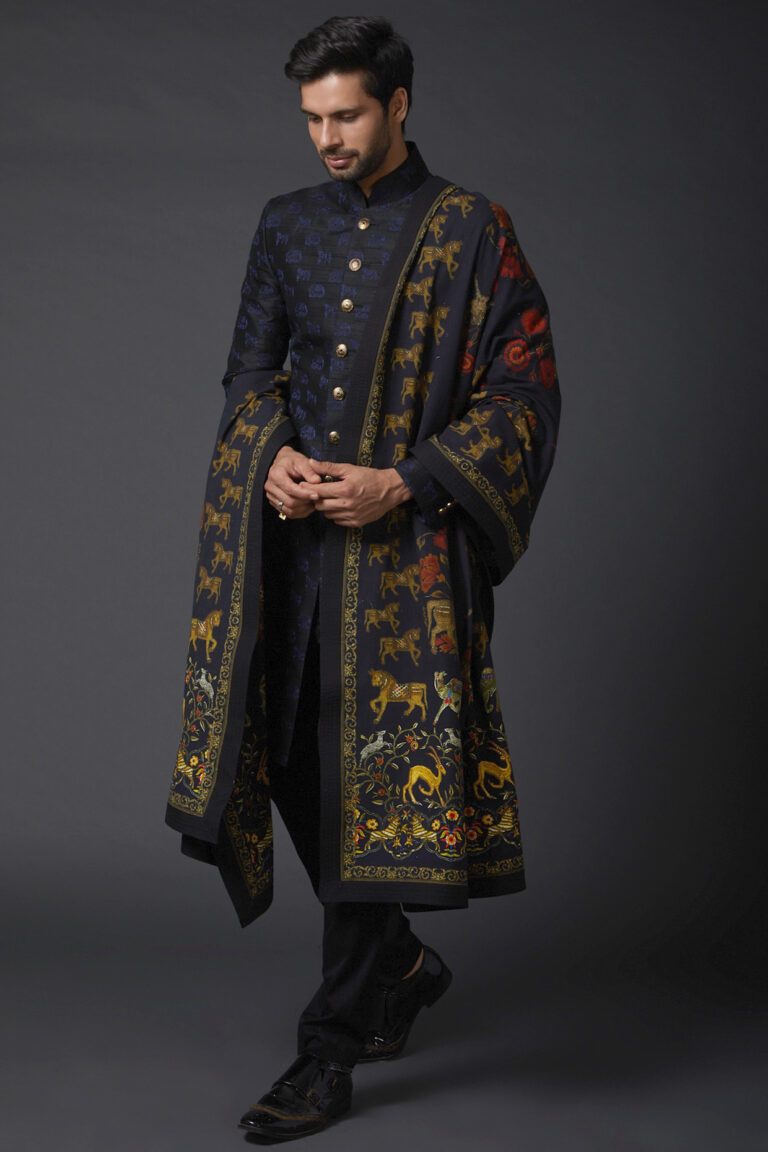 Featuring an indigo blue shawl in khadi base with digital print. This contains only one piece.