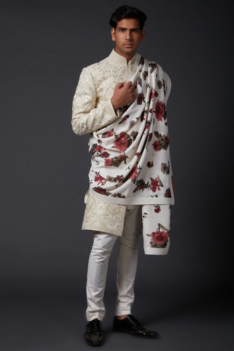 Featuring an ivory shawl in khadi base with digital print. This contains only one piece.