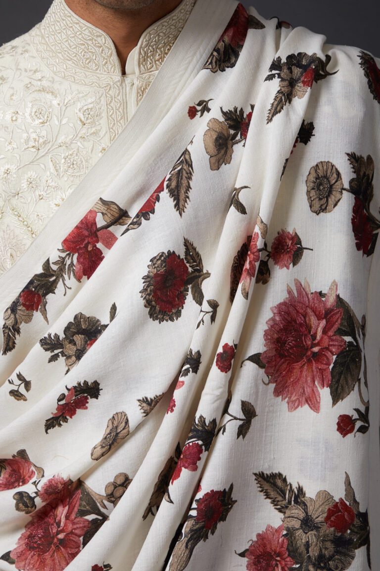 Featuring an ivory shawl in khadi base with digital print. This contains only one piece.