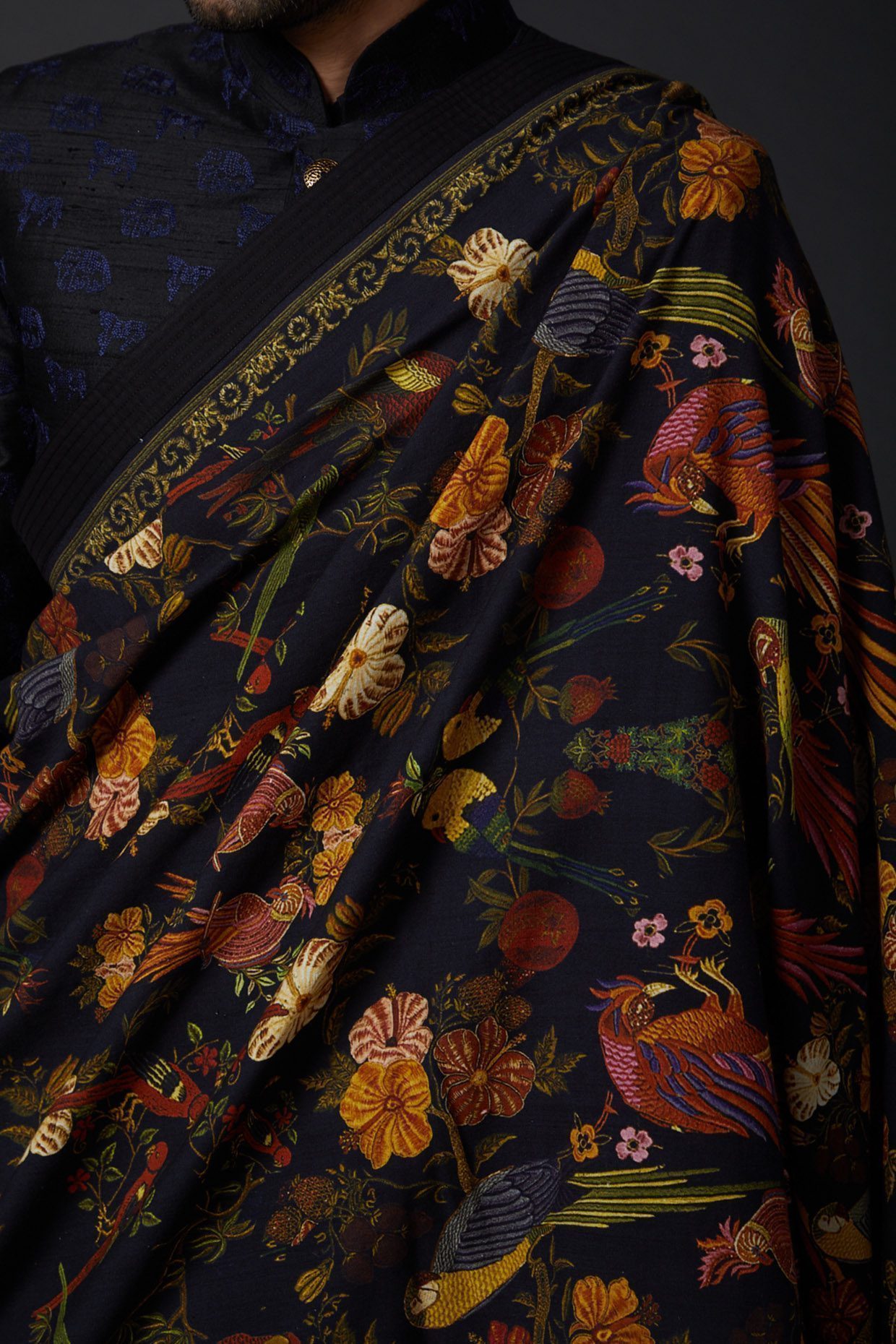 Featuring an indigo blue shawl in khadi base with digital print. This contains only one piece.