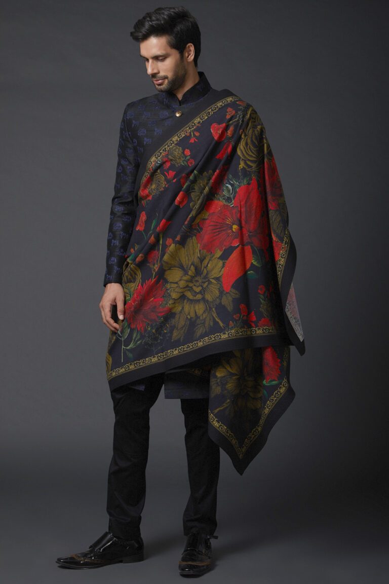 Featuring an indigo blue shawl in khadi base with digital print. This contains only one piece.