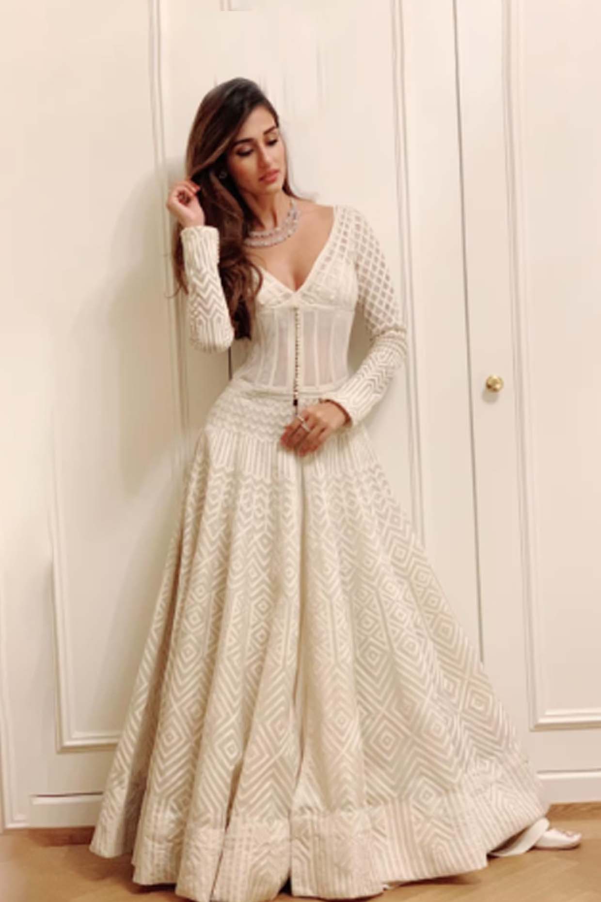 WOMEN'S BLACK JACKET, LEHENGA AND PEPLUM