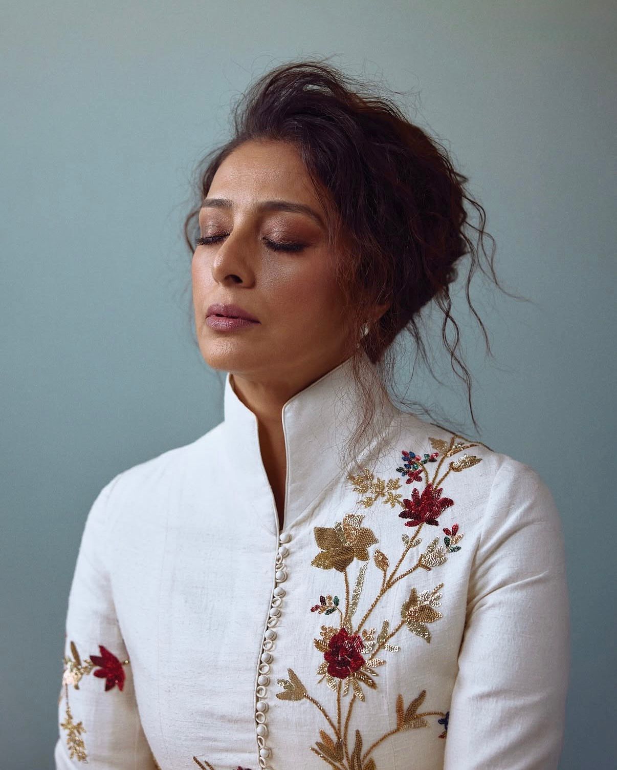 Tammu Stuns in an Ivory Embroidered Long Jacket